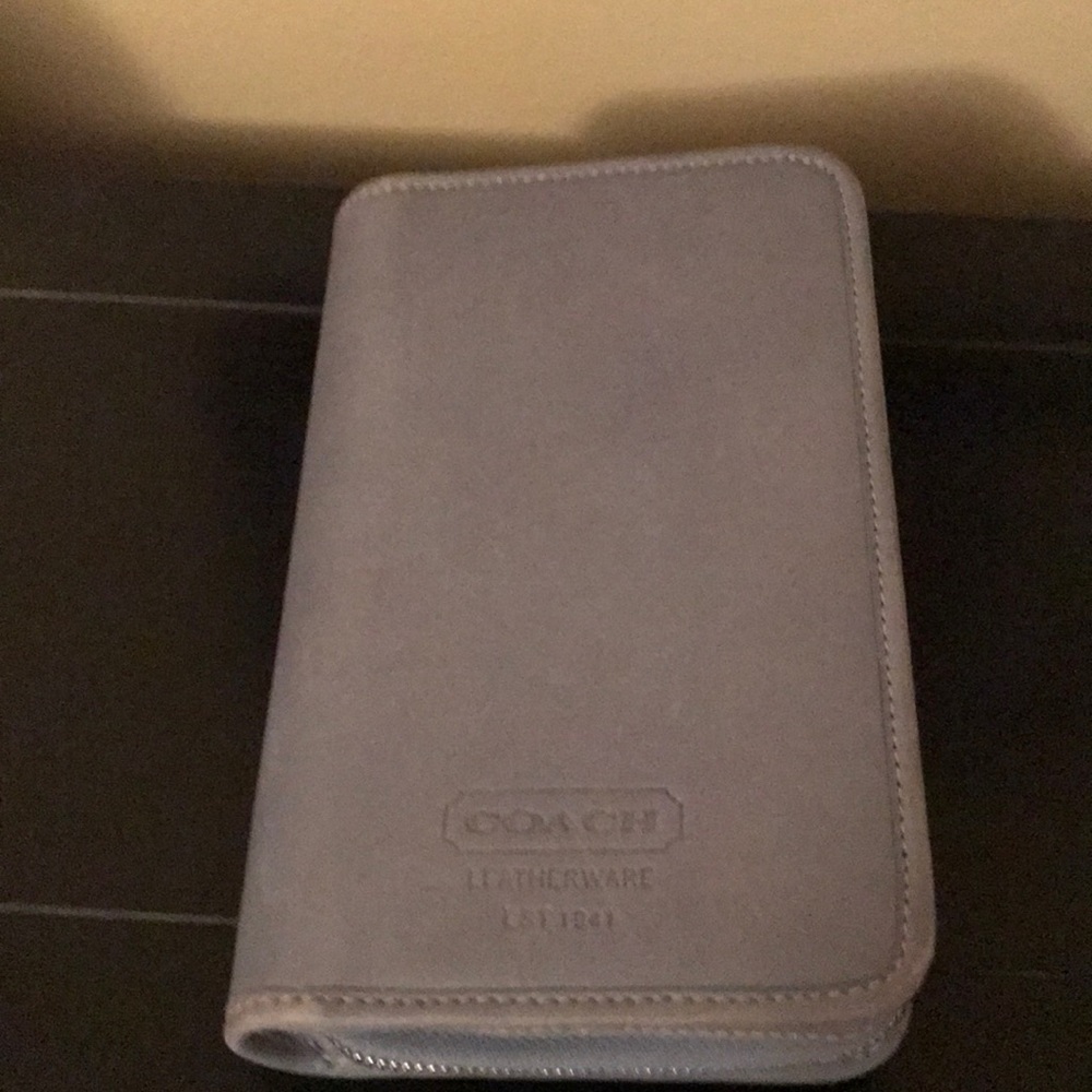 Coach wallet that has a great amount of storage